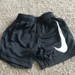 Nike black Dri-Fit shorts.